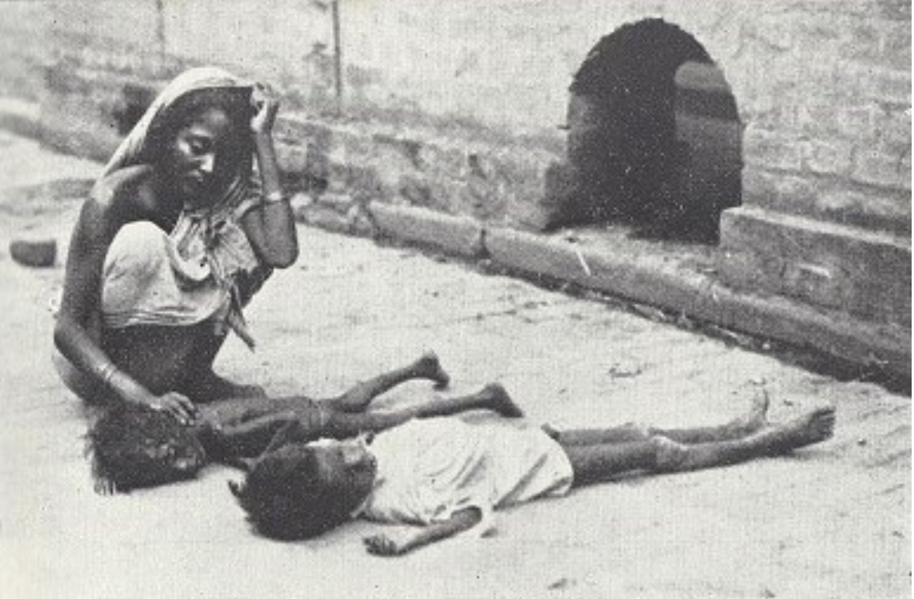 An image published in The Statesman of a woman and child dying on the street during the Bengal famine of 1943